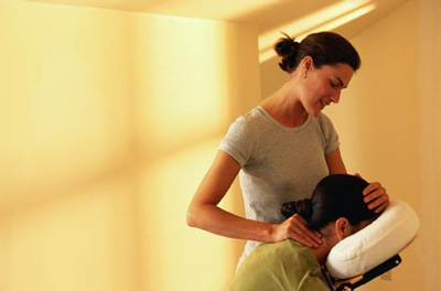 Woman getting a seated massage