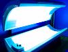 open tanning bed with lights on
