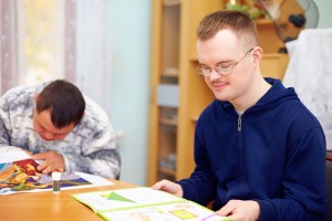 young-man-studying-at-rehabilitation-center