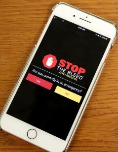 phone with Stop the Bleed app displayed