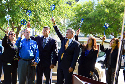 Florida Department of Health Executive Staff holding up pinwheels