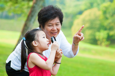 Asian mother teaching her daughter