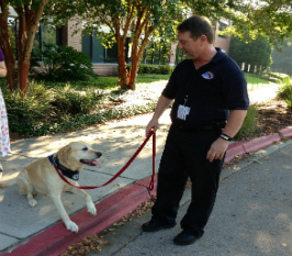 Image of man and service dog