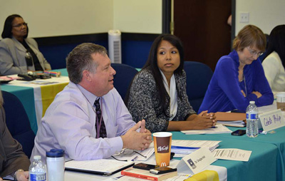 DOH and CDC Tuberculosis Partnership meeting photoImage of several attendees at the conference tables.