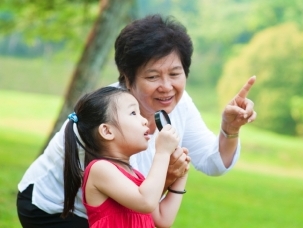 Grandmother teaching granddaughter