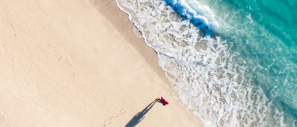 areal image of a person at the beach