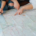 People pointing to a map for special needs shelters