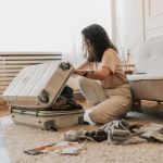 Woman packing to go to a special needs shelter