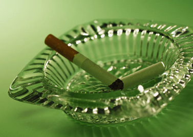 picture of an ashtray with a cigarette