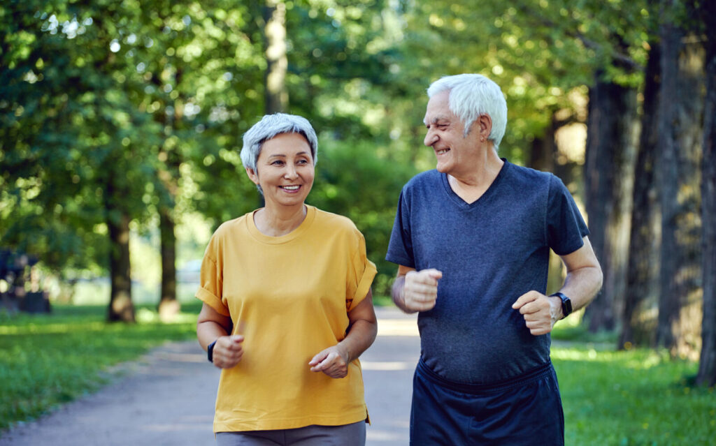 Senior couple walking in a park