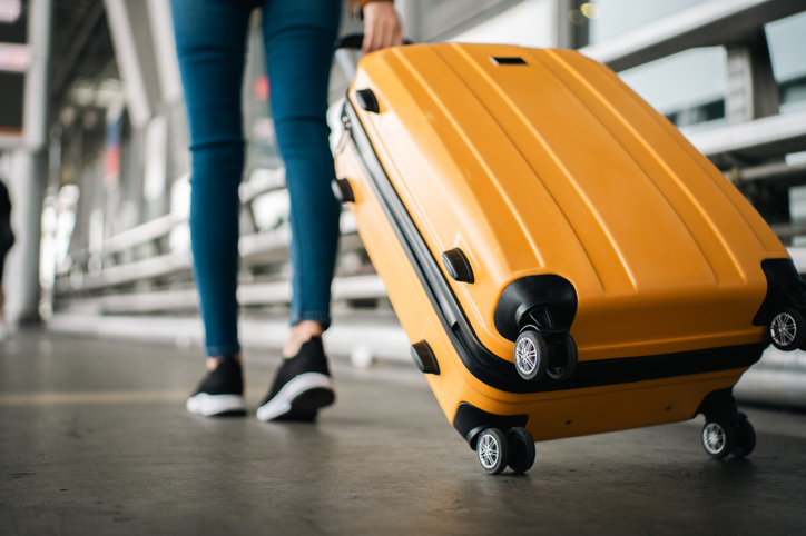 Peson with suitcase in airport