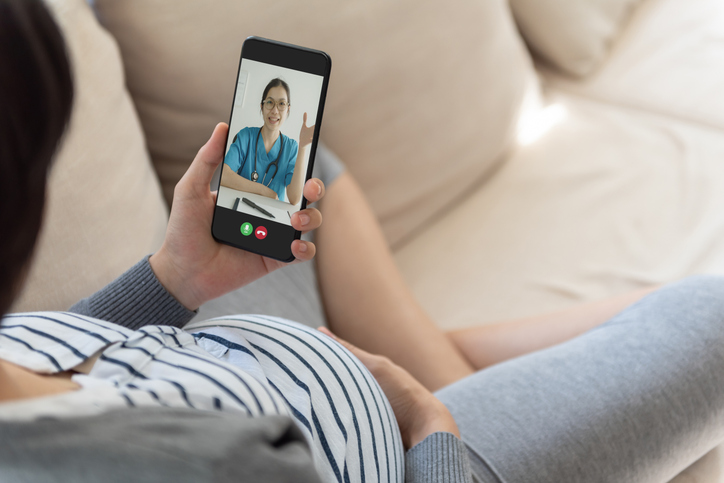 Telehealth video chat with pregnant woman and health care provider