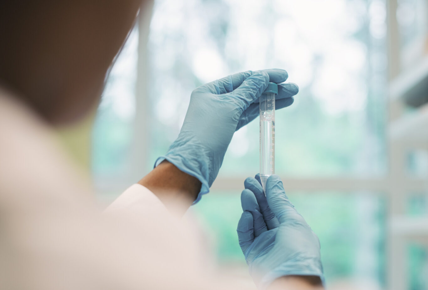 Laboratory staff reviewing sample