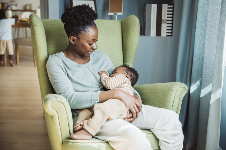 Woman breastfeedinf infant