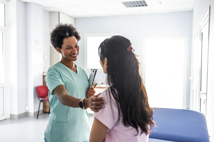Woman talking to her health care provider