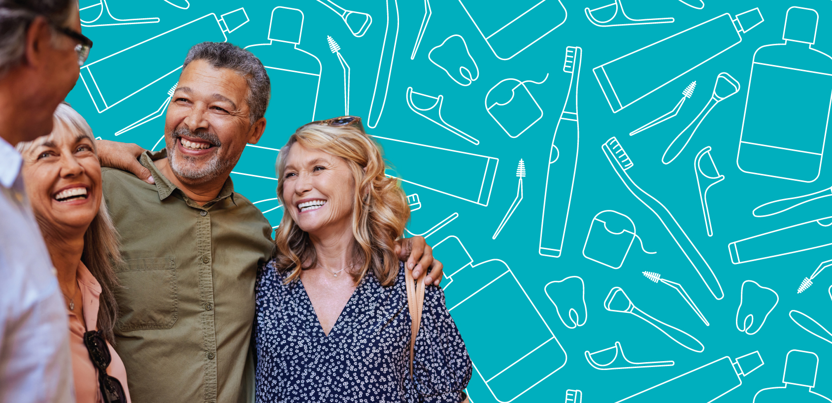 Four smiling adults standing in front of dental hygiene products