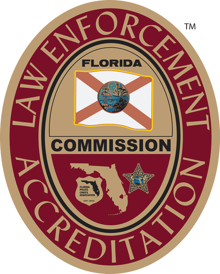 Logo for the Florida Law Enforcement Accreditation Commission. It's an oval with 'LAW ENFORCEMENT ACCREDITATION' on the outer ring. Inside are the Florida flag, the word 'COMMISSION', a map of Florida with 'FLORIDA POLICE CHIEFS ASSOCIATION EST. 1952', and a sheriff's star badge.