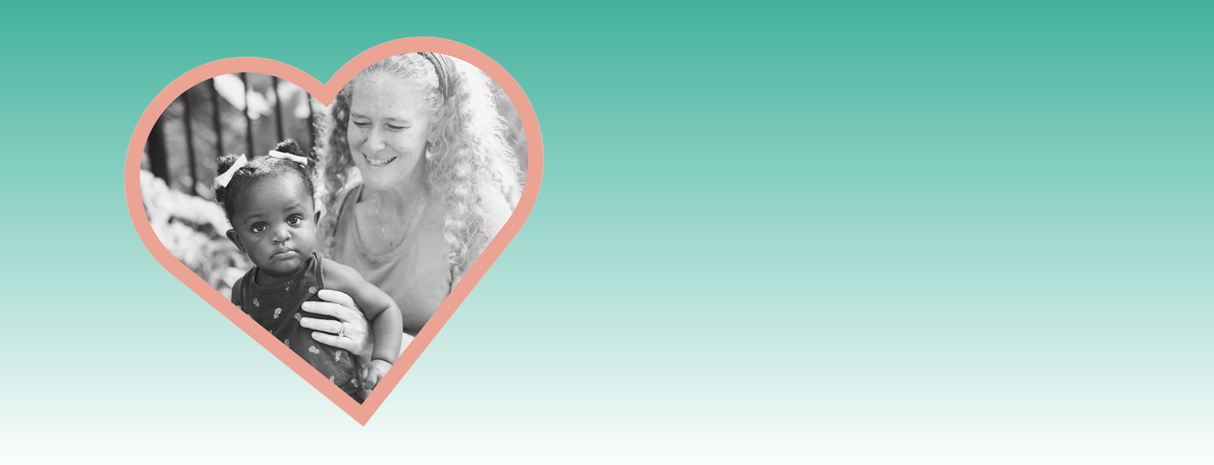 Black and white photo of a smiling woman holding a baby with bows in her hair, framed in a pink-bordered heart on a teal gradient background.