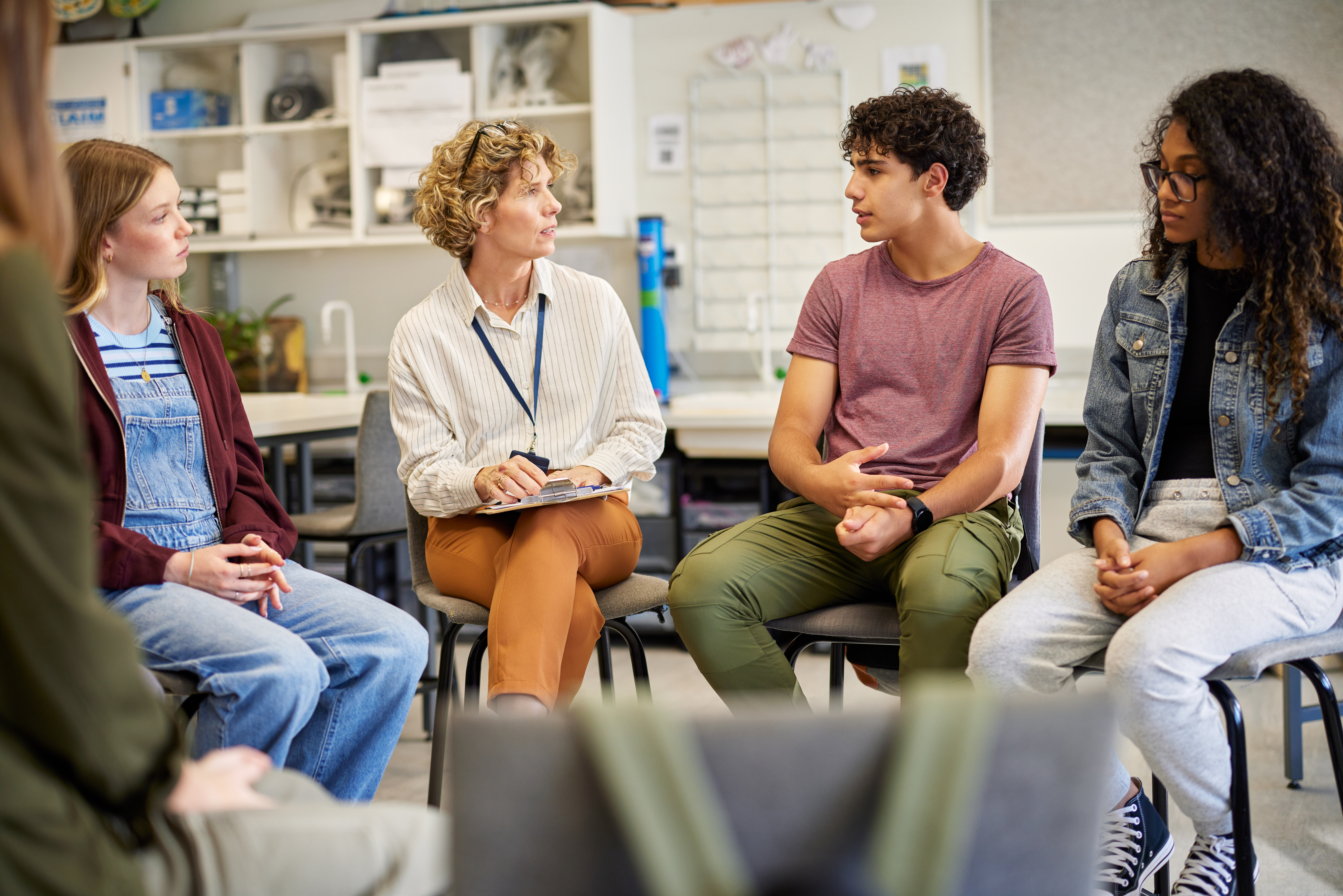 Teenagers in classroom discussion